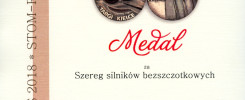 Dyplom z Salonu Robotyki Przemysłowej. Kluczowe obiekty: dyplom, medal, nazwy instytucji. Kontekst: nagroda.